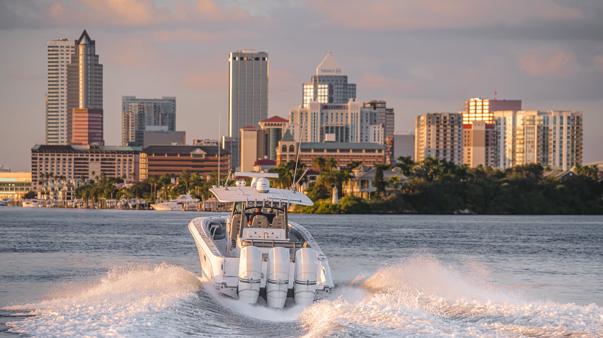 A white boat equipped with life jackets in the water